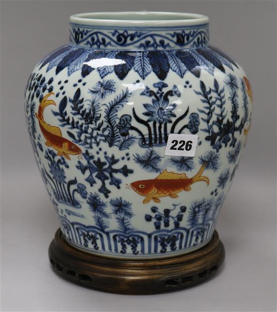 A Chinese blue and white fish pattern vase on stand H. 28cm inclding stand